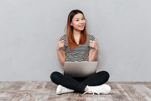 System Stream - working on laptop thumbs up
