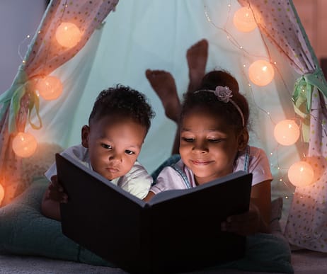 Children Reading a Book