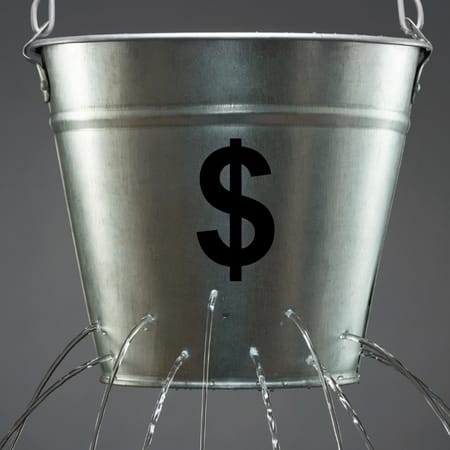 Leaky Bucket with Dollar Sign